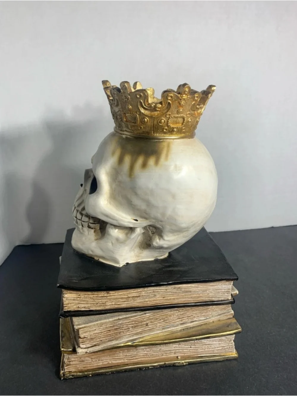 Decorative White and Gold Skull on Stacked Spell Books - Home Accent